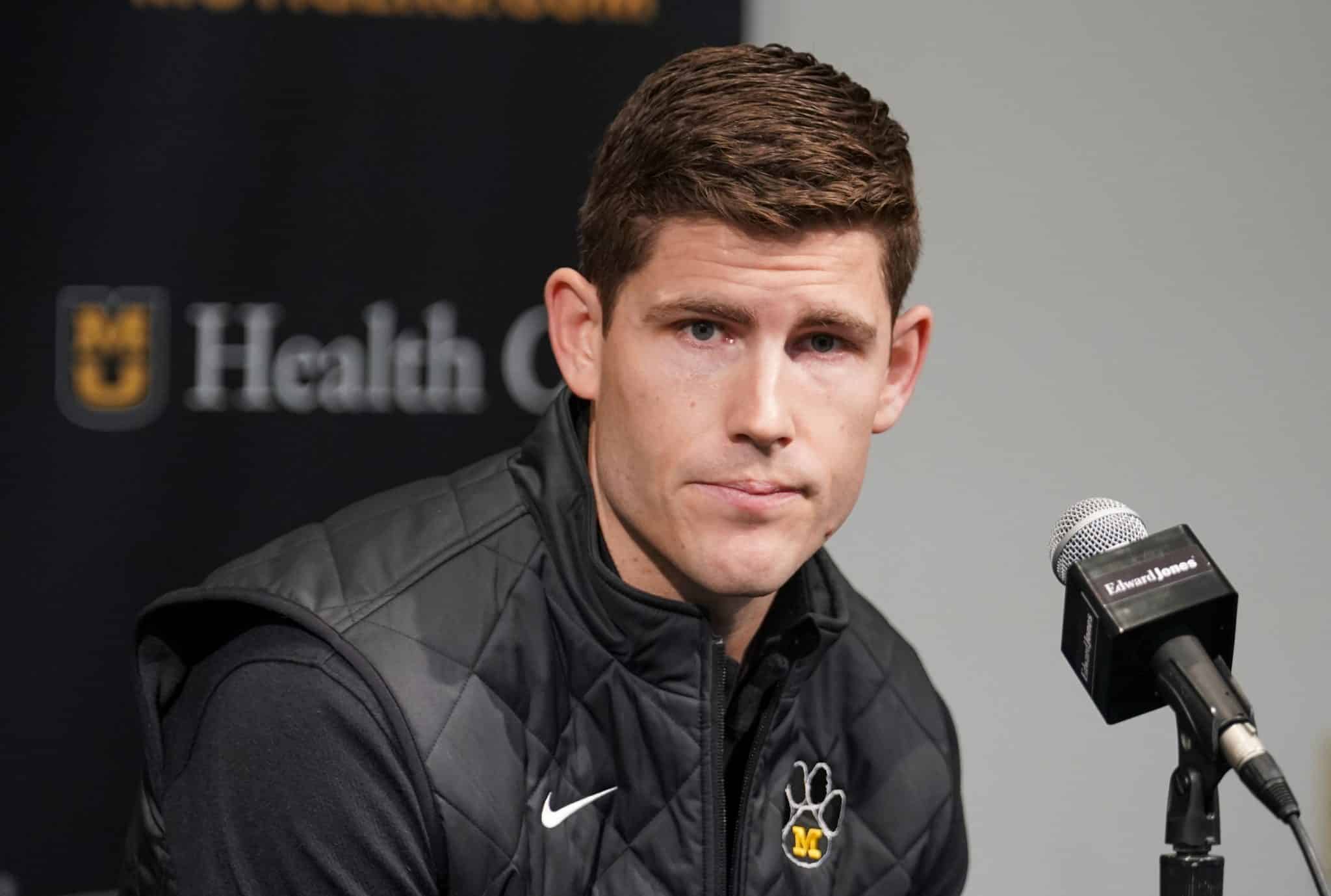 Kirby Moore at a press conference.